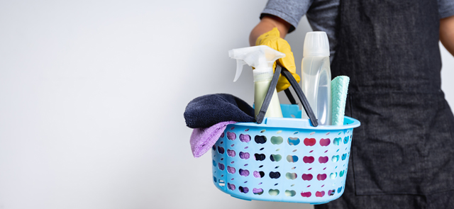 Man Janitor Holding Basket Of Cleaning Supplies Preparing To Cle
